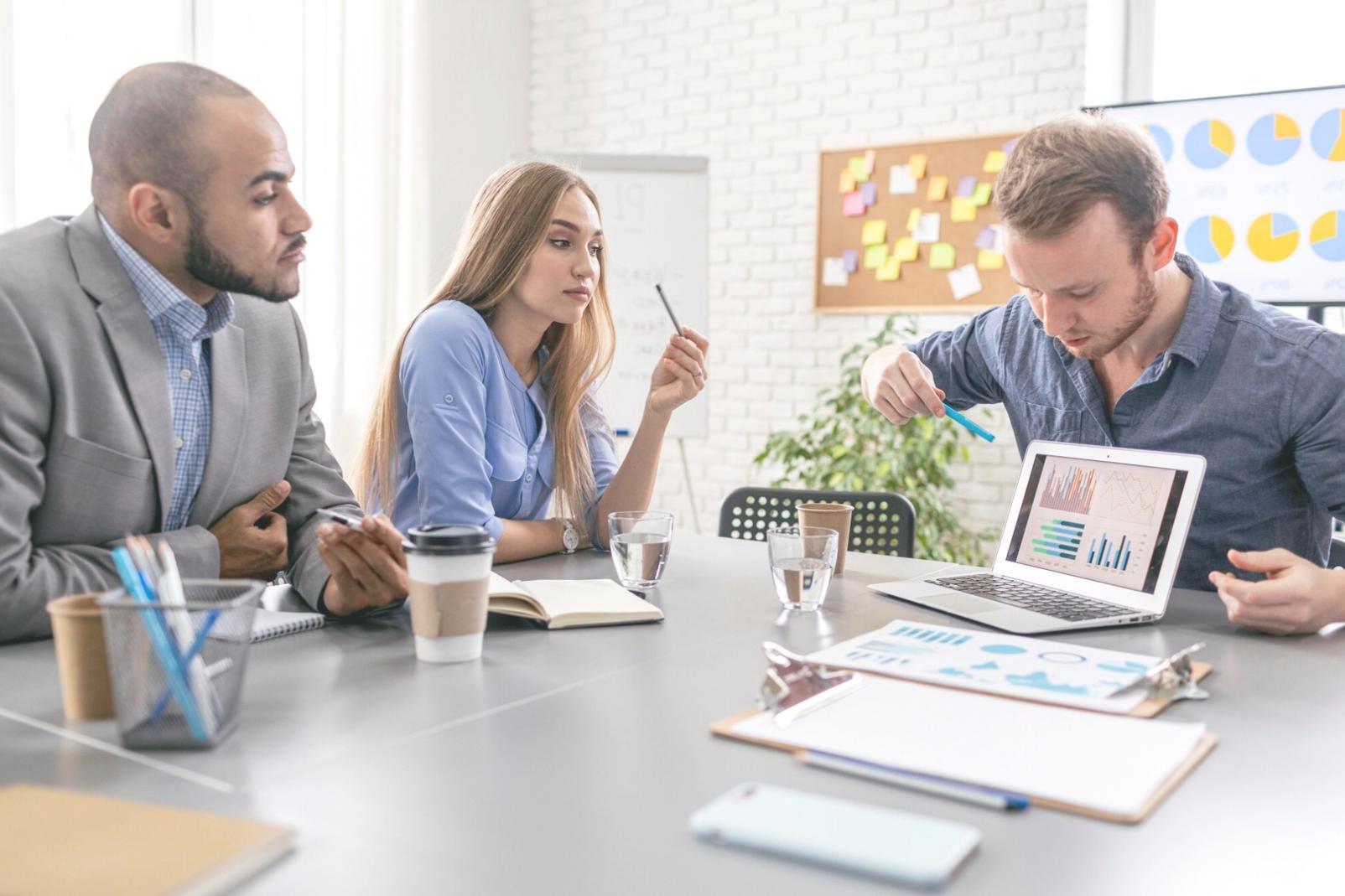 Professional team members collaborating on project planning